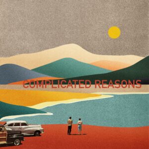 Tobias Zaldua single cover artwork shows illustrated photo of a couple standing near two old fashioned American cars parked in front of colourful textured mountains and a lake with a low hanging yellow sun on the horizon. The sun casts strong shadows from the couple who stand on an orange-coloured shore. The large text on the opposite shore reads 'Complicated reasons'